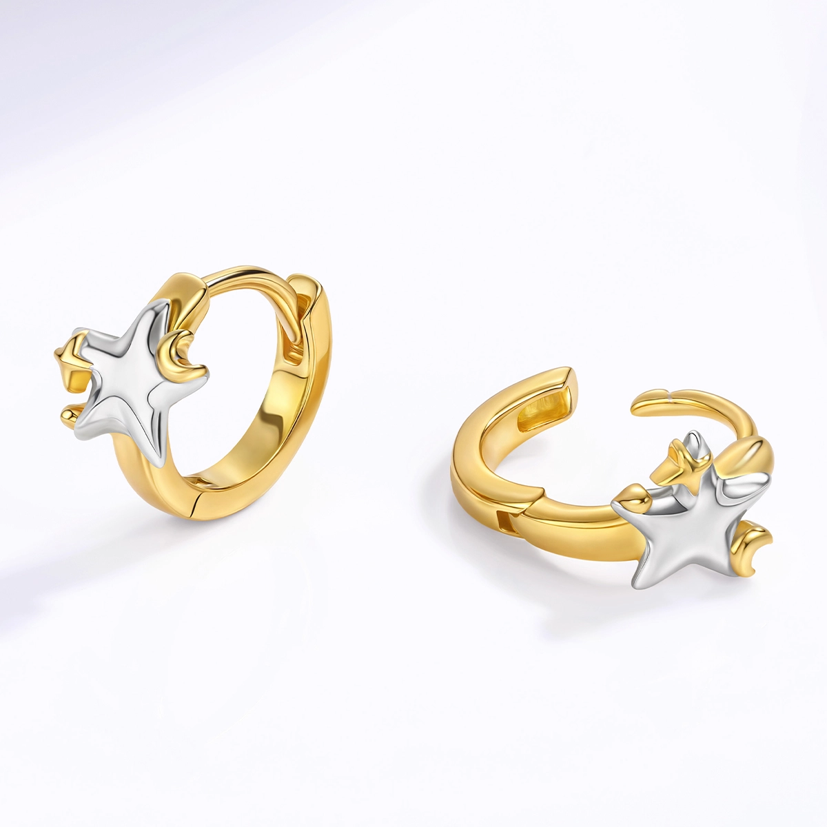 925 silver celestial star hoop earrings displayed on a white background