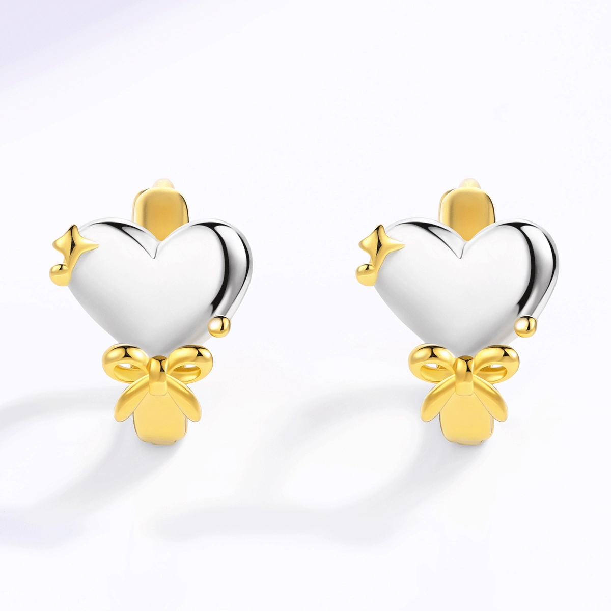 Side view showing the hinged hoop structure of 925 sterling silver heart earrings for OEM jewelry production.