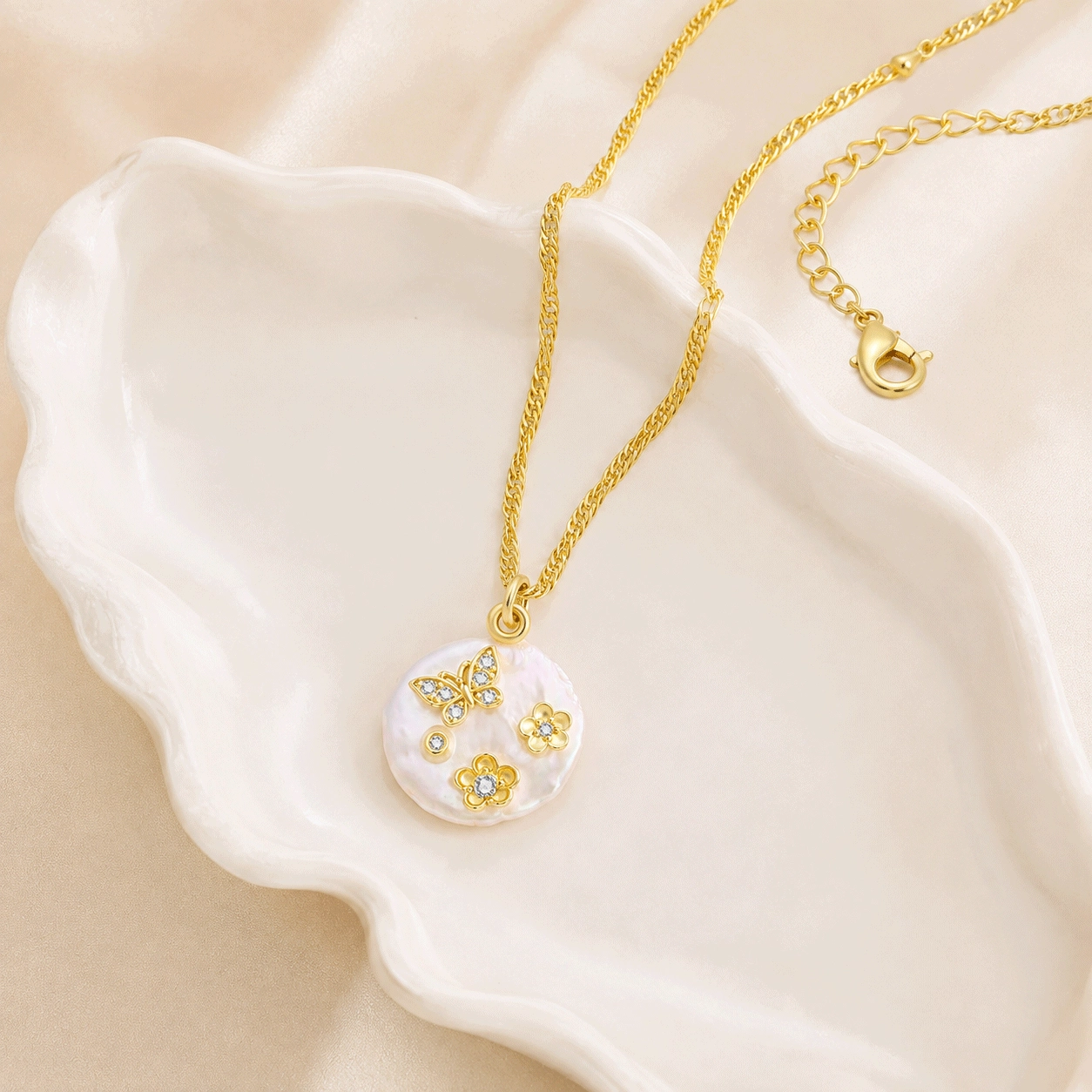 Gold vermeil pearl necklace option developed on a confirmed sterling silver specification