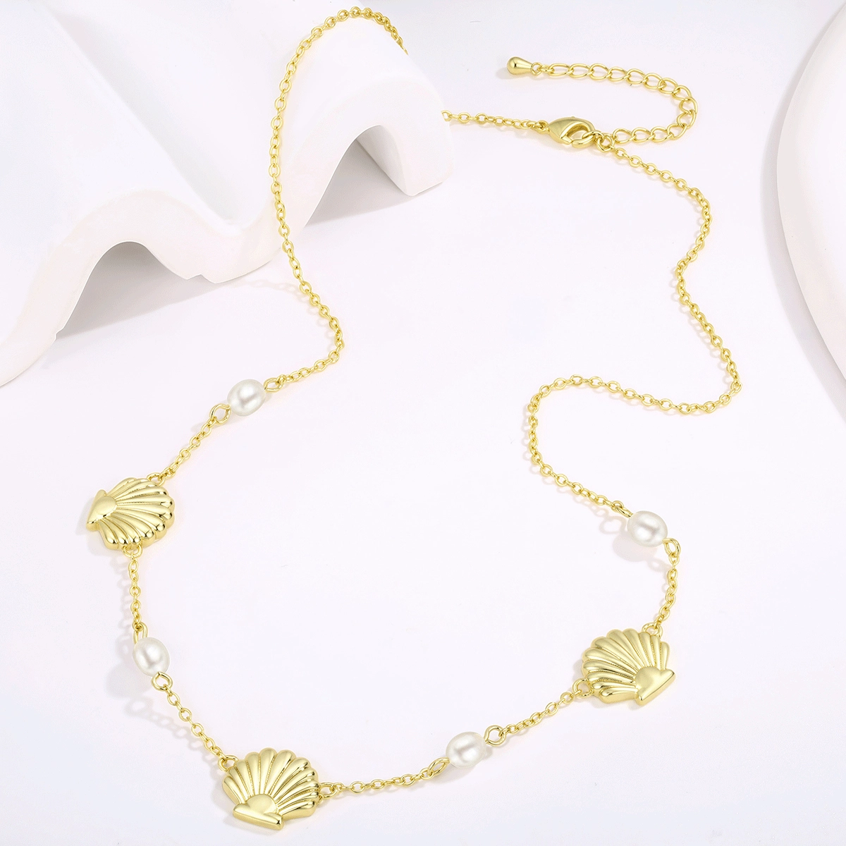 gold-vermeil-pearl-necklace-wholesale-display - Zhefan Jewelry Gold vermeil option pearl necklace presented in a professional jewelry studio environment - Zhefan Jewelry