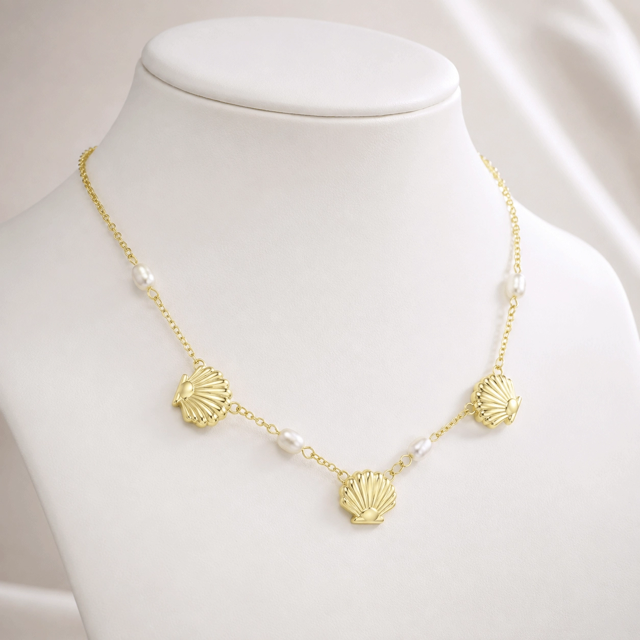 OEM pearl necklace featuring shell shaped elements and spaced freshwater pearls - Zhefan Jewelry